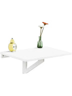 Table à manger pliante murale en bois de 60 x 40 cm dépliée contre un mur