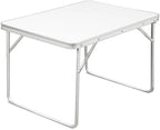 Table bateau pliante avec cadre aluminium dans un carré de cabine