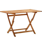 Table bois pliante extérieur en acacia massif huilé 120 x 70 cm sur une terrasse