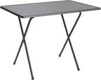Table pliante de balcon en métal de 80 x 50 cm contre un mur